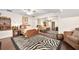 Nicely staged bedroom with hardwood floors, full size bed and mirrored closet at 1 Crooked Bridge Way, Ormond Beach, FL 32174