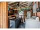 Back porch features a ceiling fan, washer and dryer hookups and exterior lighting at 1333 E Lombardy Dr, Deltona, FL 32725