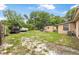 The backyard has a shed, grassy area and is spacious enough for parking at 1333 E Lombardy Dr, Deltona, FL 32725