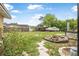 Backyard features a fire pit, storage shed, room for parking with grassy area at 1333 E Lombardy Dr, Deltona, FL 32725