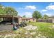 Backyard features a shed, lawn mower and is spacious enough for outdoor activities at 1333 E Lombardy Dr, Deltona, FL 32725