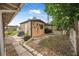 The backyard has a shed, room for parking and a grassy area for activities at 1333 E Lombardy Dr, Deltona, FL 32725