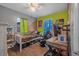 A unique bedroom, equipped with a bed, desk, and modern decor at 1333 E Lombardy Dr, Deltona, FL 32725