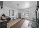 Spacious living room with a view of the front door, bright walls, and tile flooring at 1333 E Lombardy Dr, Deltona, FL 32725