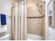 Clean bathroom with shower and tub, and a neutral color scheme at 206 St Somewhere Dr, Daytona Beach, FL 32124