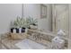 Bathroom vanity features granite counters, a white sink and a decorative basket at 206 St Somewhere Dr, Daytona Beach, FL 32124