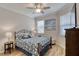 Cozy bedroom with ceiling fan and serene decor, offering a peaceful retreat at 206 St Somewhere Dr, Daytona Beach, FL 32124