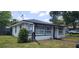 Charming single-story home with black window frames in a residential area at 279 Selden Ave, Ormond Beach, FL 32174