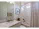 Bathroom featuring a granite vanity with a bathtub and shower combination, and neutral paint at 2861 Monaghan Dr, Ormond Beach, FL 32174