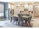 Dining room features a modern light fixture and an elegant table creating an ideal space for gatherings at 2861 Monaghan Dr, Ormond Beach, FL 32174