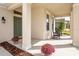 Inviting front porch with rocking chairs and decorative plants, perfect for relaxing and enjoying the outdoors at 2861 Monaghan Dr, Ormond Beach, FL 32174