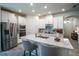 Bright kitchen featuring granite countertops, stainless steel appliances, and ample storage space for the modern home at 2861 Monaghan Dr, Ormond Beach, FL 32174