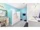 Stylish bathroom with dual sinks and a tub shower combo at 2910 Yule Tree Dr, Edgewater, FL 32141