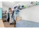 Walk-in closet with clothing and wire shelving storage at 2910 Yule Tree Dr, Edgewater, FL 32141
