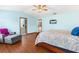 Bright main bedroom boasts a sitting area and ensuite bathroom at 2910 Yule Tree Dr, Edgewater, FL 32141
