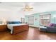 Spacious main bedroom with wood floors, vaulted ceiling, and natural light at 2910 Yule Tree Dr, Edgewater, FL 32141