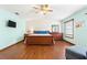 Generous main bedroom features wood floors and vaulted ceilings at 2910 Yule Tree Dr, Edgewater, FL 32141