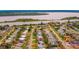 Stunning aerial view of a vibrant waterfront neighborhood with lush greenery and serene water views at 33 Camellia Dr, Ormond Beach, FL 32176