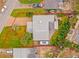 Expansive aerial view showcasing the property layout, landscaping, and surrounding neighborhood at 33 Camellia Dr, Ormond Beach, FL 32176