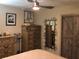 Bedroom with stylish dressers, a ceiling fan, and a serene ambiance at 33 Camellia Dr, Ormond Beach, FL 32176