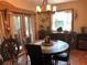 Dining room featuring stylish decor, unique furnishings, and plenty of natural light at 33 Camellia Dr, Ormond Beach, FL 32176