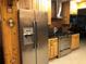 Modern kitchen showcasing stainless steel appliances and custom wood cabinetry at 33 Camellia Dr, Ormond Beach, FL 32176