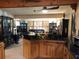 Open floor plan with kitchen island seamlessly connecting to the living room at 33 Camellia Dr, Ormond Beach, FL 32176