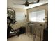 Cozy living room featuring modern ceiling fan, natural light, and elegant furniture for a relaxing atmosphere at 33 Camellia Dr, Ormond Beach, FL 32176