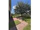 Backyard featuring brick patio and expansive lawn space at 3660 Daydream Pl, St Cloud, FL 34772