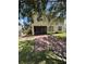 Charming home with a screened porch and brick paver patio in a well-manicured backyard at 3660 Daydream Pl, St Cloud, FL 34772