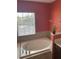 Bright bathroom featuring a garden tub with a window providing natural light and privacy at 3660 Daydream Pl, St Cloud, FL 34772