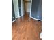 Bedroom with neutral paint and wood flooring at 3660 Daydream Pl, St Cloud, FL 34772