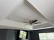 Close-up of ceiling with tray ceiling detail and ceiling fan at 3660 Daydream Pl, St Cloud, FL 34772