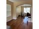 Elegant dining room with gleaming hardwood floors and ample natural light at 3660 Daydream Pl, St Cloud, FL 34772