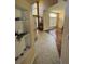 Inviting foyer with tile flooring transitioning to hardwood, showcasing a two-story entrance and natural light at 3660 Daydream Pl, St Cloud, FL 34772