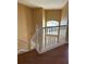 Entry way with front door view, tall ceiling, and carpeted stairs at 3660 Daydream Pl, St Cloud, FL 34772