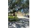 Charming two-story home with a well-manicured lawn, mature tree, and three-car garage at 3660 Daydream Pl, St Cloud, FL 34772