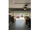 Spacious garage showcasing a clear view of the exterior with two parked cars and organized storage boxes at 3660 Daydream Pl, St Cloud, FL 34772