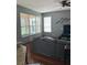 Cozy living room with neutral tones and a large window for natural light at 3660 Daydream Pl, St Cloud, FL 34772
