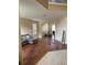 Bright living room boasts hardwood flooring, abundant natural light, and a comfortable seating area for relaxation at 3660 Daydream Pl, St Cloud, FL 34772