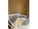 Staircase with carpeted stairs and a white banister at 3660 Daydream Pl, St Cloud, FL 34772