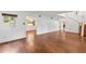 Spacious living area with hardwood floors and ample natural light from the window at 428 Pelican Bay Dr, Daytona Beach, FL 32119
