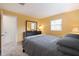 Bedroom featuring natural light, a dresser with mirror, and marble floors at 999 16Th St, Edgewater, FL 32132
