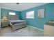 Stylish bedroom featuring bright walls and marble tile flooring at 999 16Th St, Edgewater, FL 32132