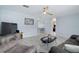 Spacious living room displaying an open floor plan, modern finishes, and seamless flow to the kitchen at 999 16Th St, Edgewater, FL 32132