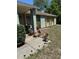 House with planters, flower pots and decor on the front porch at 1561 Copperfield Ave, Deltona, FL 32738