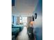 Charming bedroom with two beds, a desk, and lovely decor in calming blue tones at 1909 S Atlantic Ave # 405/406, Daytona Beach Shores, FL 32118