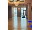 Bright hallway with marble floors, recessed lighting, and views of the ocean through the front door at 1909 S Atlantic Ave # 405/406, Daytona Beach Shores, FL 32118