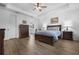 Spacious bedroom boasts a tray ceiling, lots of natural light, and modern furnishings at 2137 Raglan Cir, Ormond Beach, FL 32174