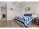 Comfortable bedroom featuring a window, closet and blue bedding at 2137 Raglan Cir, Ormond Beach, FL 32174
